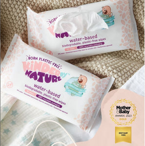 Two single packs of Kinder by Nature Water Based Baby Wipes on a baby blanket with Mother& Baby gold award 2023 image 